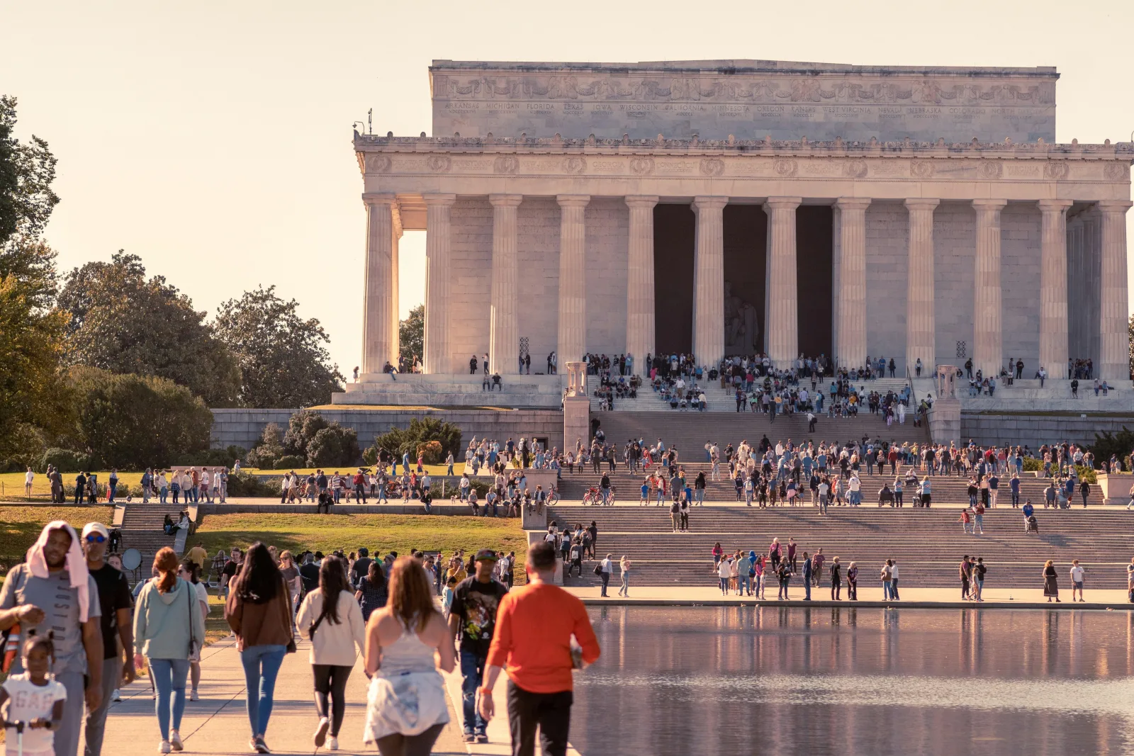 Visitors on the steps of the Lincoln Memorial