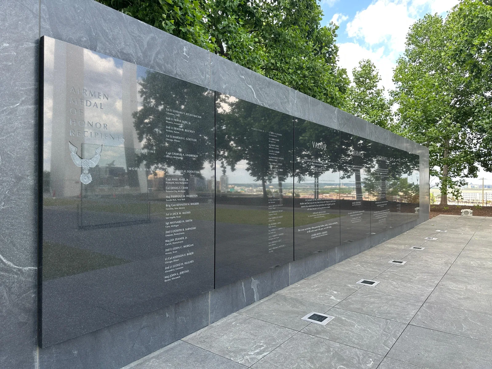 The black granite wall of the Vietnam Veterans Memorial