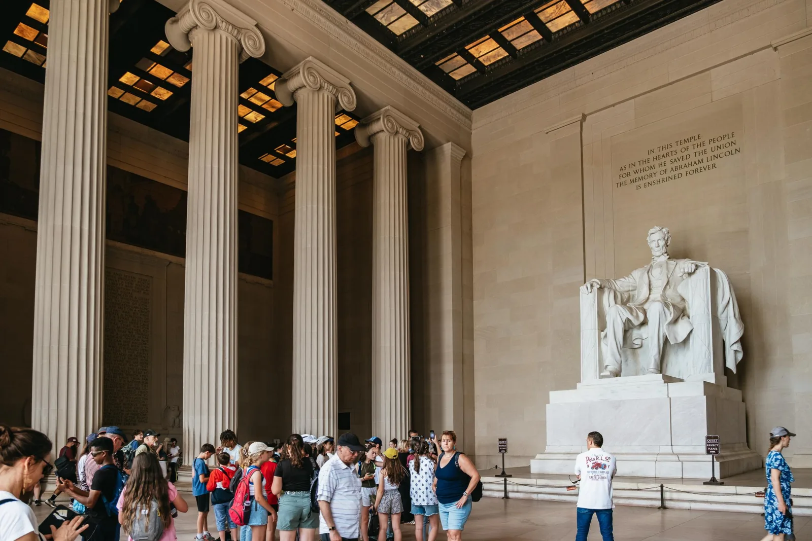 Visitors inside the Lincoln Memorial